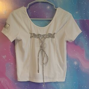 Elegant White Top with Silver Accents